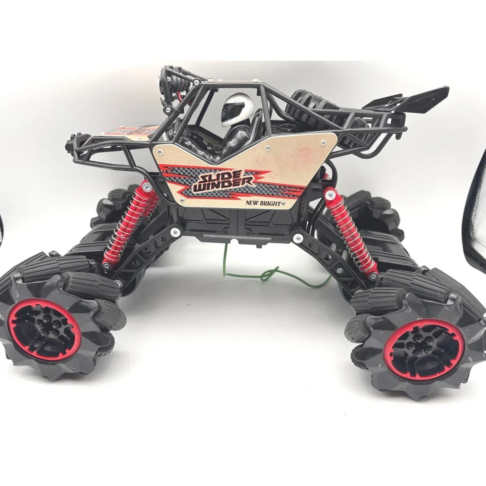 New Bright Slide Winder 4x4 RC Monster Truck Black Red Gold Roll Cage Toy